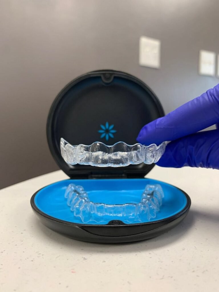 Clear aligners for Invisalign treatment at Gelos Dentistry in Zirakpur for discreet teeth straightening and smile correction